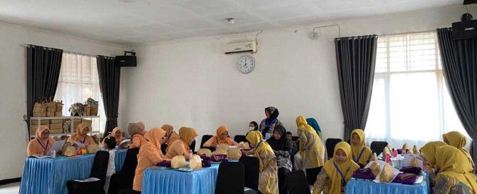 Participants attend makeup skills training in Carenang