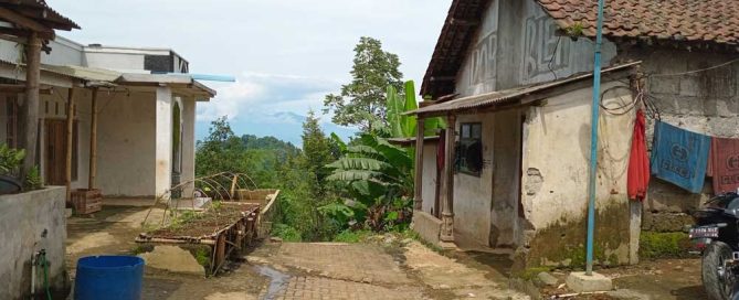 Community members near the Inspiration Bridge in Taji Village