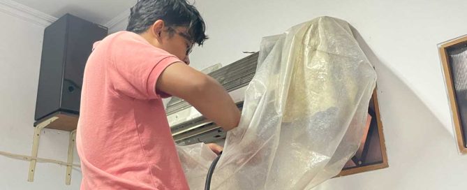 YIIM alumni clean air-conditioning units at Mushola Darussalam