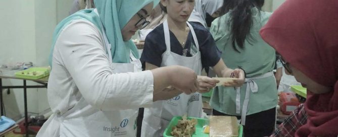 Participants practice making frozen food during YIIM entrepreneurship training